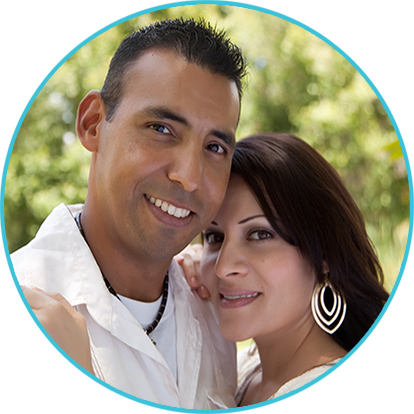Couple showing off their healthy smiles - Root Canal Services